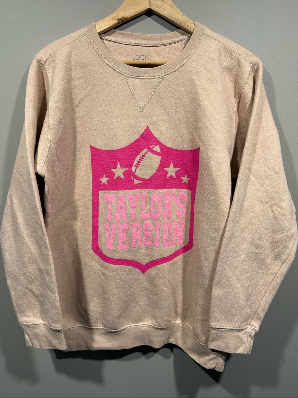 Womens Taylor Swift pink NFL Taylor's version tan shield logo crewneck sweater